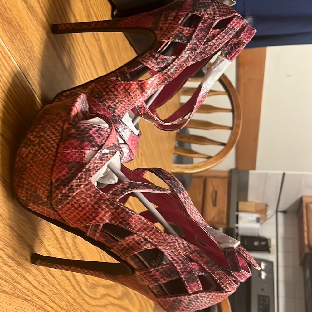 Pinkish/red and black snake print platform heels size 7.5